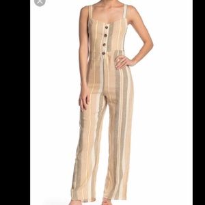 NWT Romeo and Juliet Couture jumpsuit. Size L.